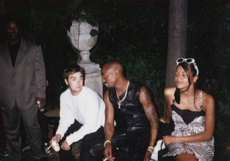 Tupac and Robbie Williams at a Versace show in .